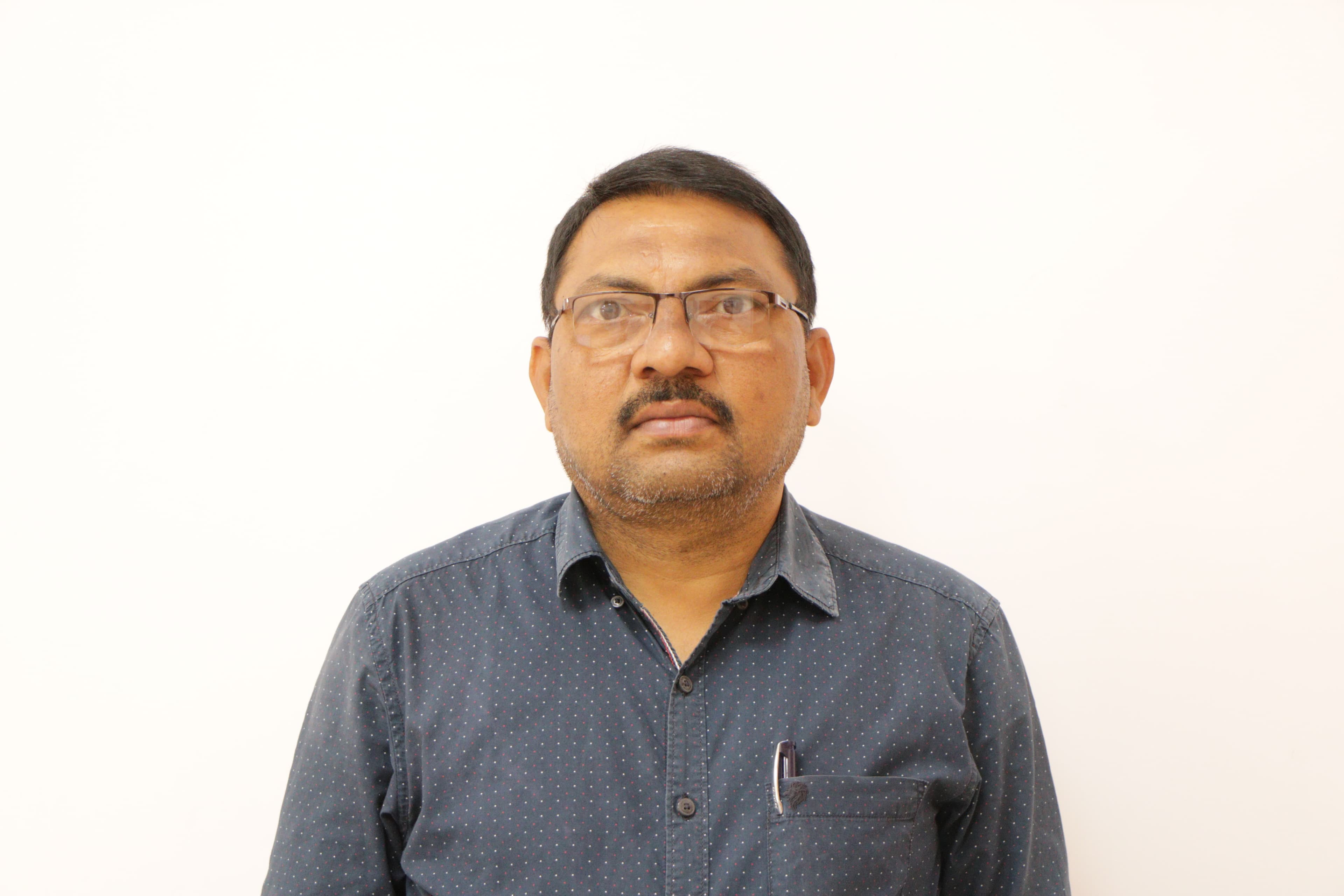 Dr. Anand Kishor Kola